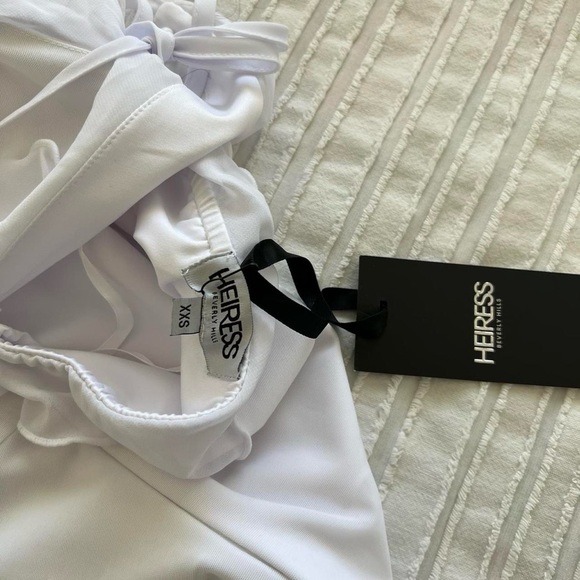 White asymmetrical ruffle dress
Brand new with tags - Picture 3 of 3